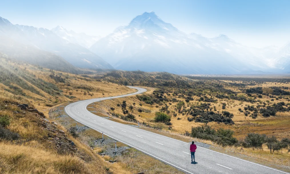 Our Mission - a man standing in a country road.